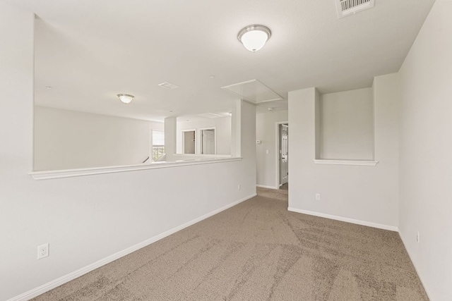 1701 S Bell Blvd Unit 101, Cedar Park, TX 78613 - unfurnished room featuring attic access, carpet, and baseboards
