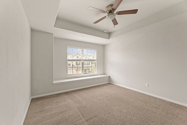 1701 S Bell Blvd Unit 101, Cedar Park, TX 78613 - spare room with ceiling fan, carpet, baseboards, and a raised ceiling