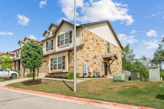 1701 S Bell Blvd Unit 101, Cedar Park, TX 78613 - multi unit property featuring stone siding, stucco siding, a front yard, cooling unit, and driveway