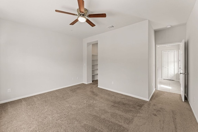 1701 S Bell Blvd Unit 101, Cedar Park, TX 78613 - carpeted spare room featuring a ceiling fan and baseboards