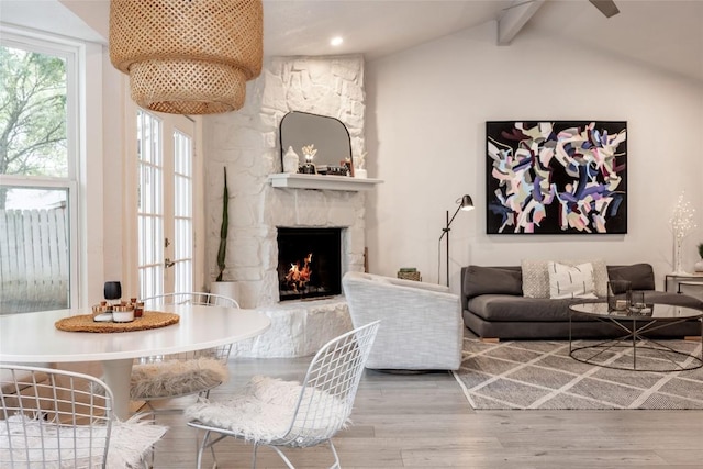4601 Candletree Ln, Austin, TX 78744 - living room featuring wood finished floors and a stone fireplace