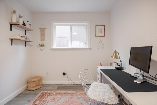 4601 Candletree Ln, Austin, TX 78744 - office space featuring wood finished floors and baseboards