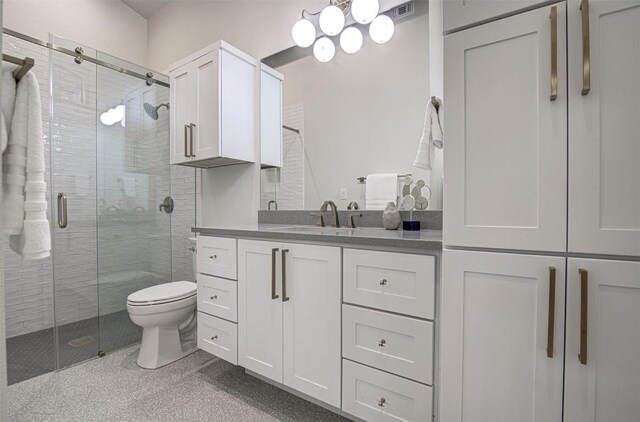 19543 Lakehurst Loop, Spicewood, TX 78669 - full bath featuring a shower stall, toilet, and vanity