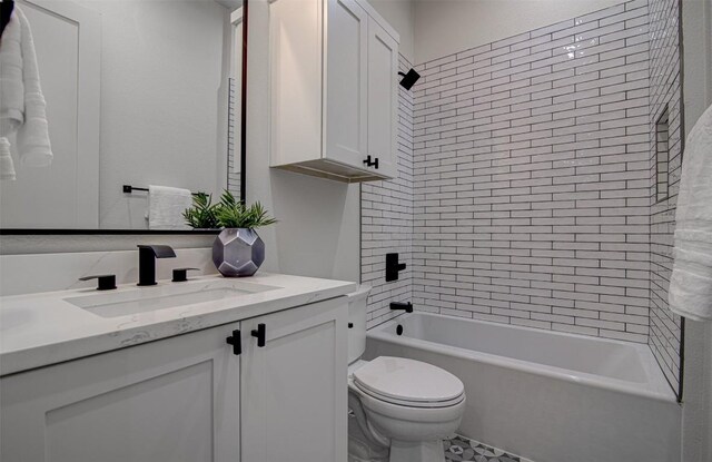 19543 Lakehurst Loop, Spicewood, TX 78669 - bathroom with vanity, toilet, and tub / shower combination