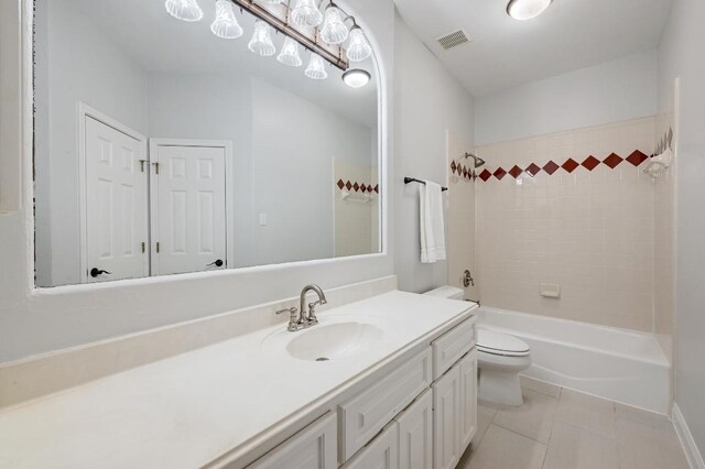 12004 Mira Mesa Dr, Austin, TX 78732 - bathroom with vanity, toilet, tub / shower combination, and tile patterned flooring