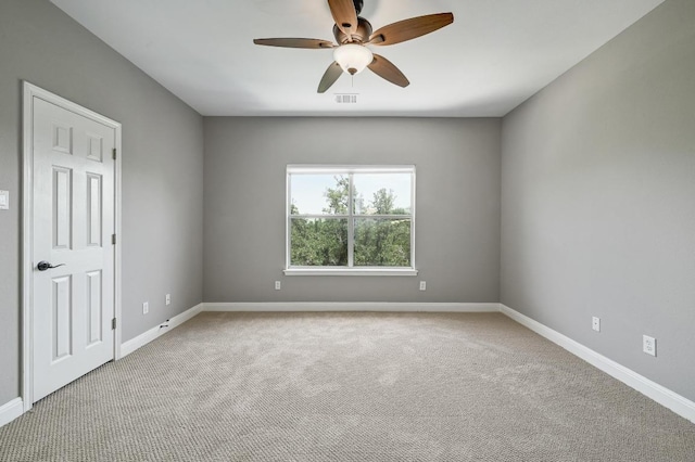 12004 Mira Mesa Dr, Austin, TX 78732 - spare room featuring ceiling fan, carpet flooring, and baseboards