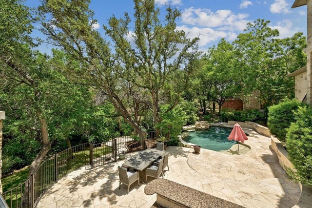 12004 Mira Mesa Dr, Austin, TX 78732 - view of patio featuring view of scattered trees