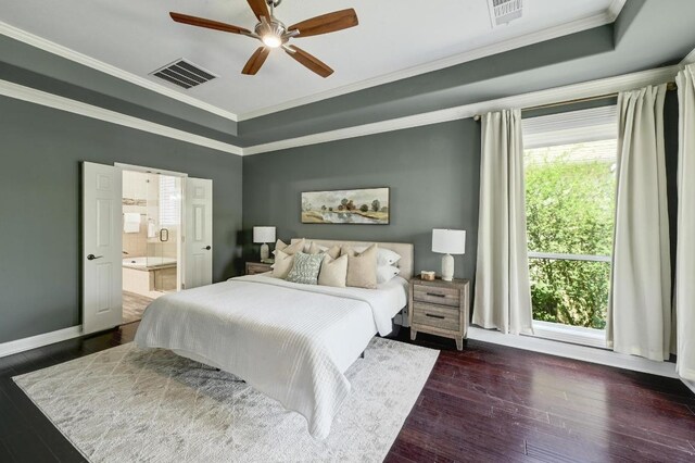 12004 Mira Mesa Dr, Austin, TX 78732 - bedroom with a tray ceiling, ornamental molding, dark wood finished floors, connected bathroom, and a ceiling fan