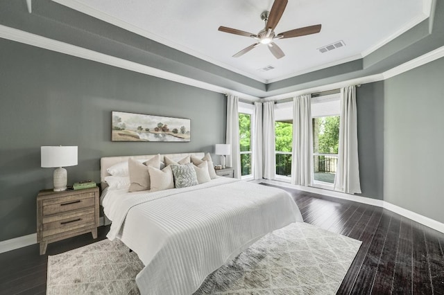 12004 Mira Mesa Dr, Austin, TX 78732 - bedroom featuring crown molding, wood-type flooring, a raised ceiling, and a ceiling fan