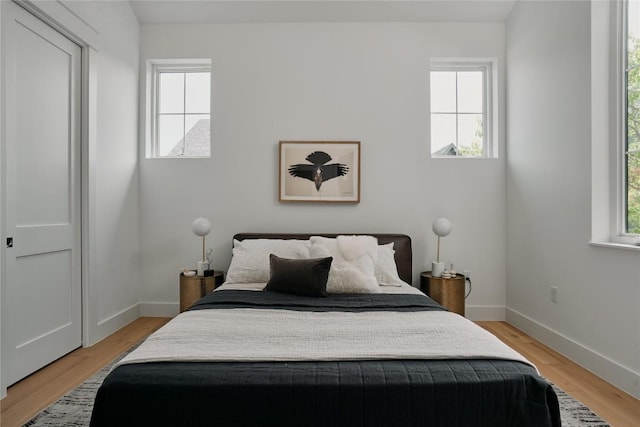 113 Nelray Blvd Unit 2, Austin, TX 78751 - bedroom with light wood-type flooring and baseboards