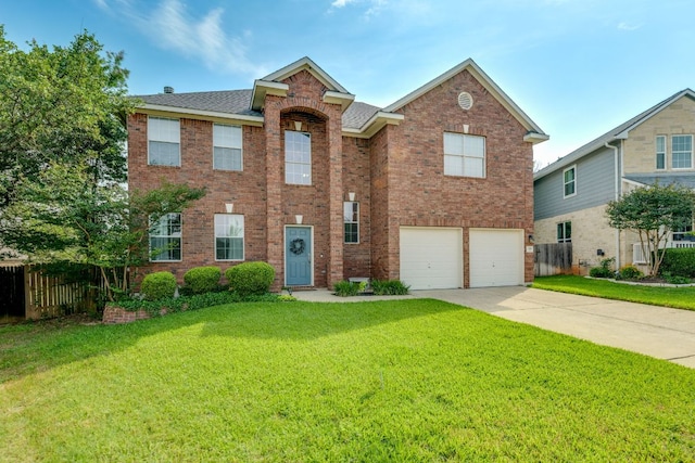 1414 Shamitas Ct, Leander, TX 78641 - view of front of home with an attached garage, concrete driveway, brick siding, and roof with shingles
