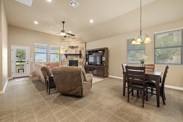 2217 Hilltop Climb Dr, Leander, TX 78641 - living room featuring lofted ceiling, a ceiling fan, a chandelier, healthy amount of natural light, and baseboards