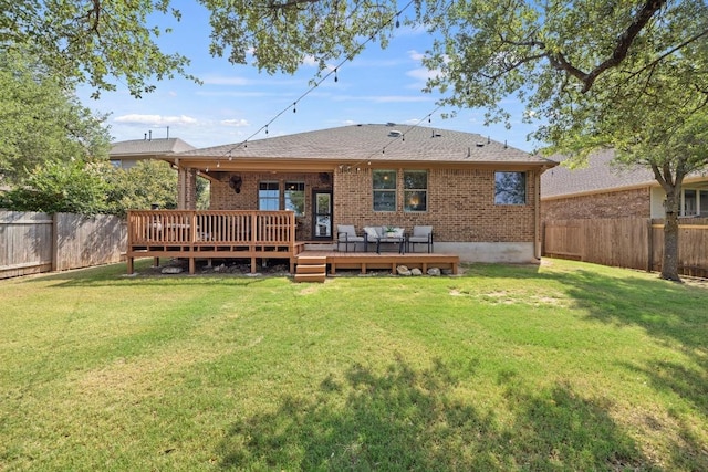 2217 Hilltop Climb Dr, Leander, TX 78641 - back of house with brick siding and a wooden deck