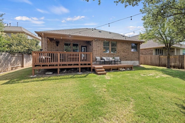 2217 Hilltop Climb Dr, Leander, TX 78641 - back of property with brick siding, a wooden deck, an outdoor hangout area, and roof with shingles