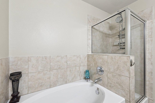 2632 Century Park Blvd Unit 38, Austin, TX 78727 - full bathroom with a bath and a stall shower
