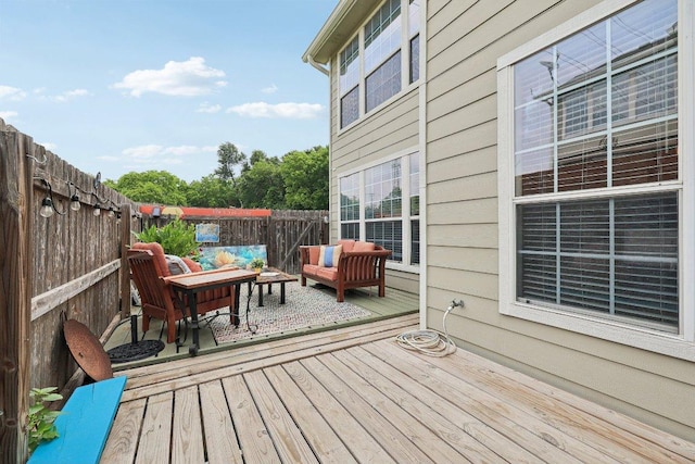 2632 Century Park Blvd Unit 38, Austin, TX 78727 - wooden deck with an outdoor living space and a fenced backyard