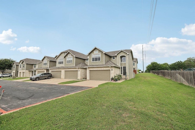 2632 Century Park Blvd Unit 38, Austin, TX 78727 - townhome / multi-family property featuring a garage, concrete driveway, and a residential view