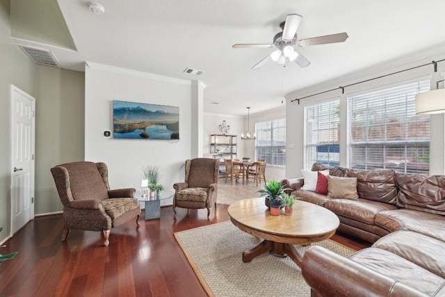 2632 Century Park Blvd Unit 38, Austin, TX 78727 - living area featuring a ceiling fan, dark wood-style floors, a chandelier, crown molding, and baseboards
