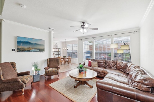 2632 Century Park Blvd Unit 38, Austin, TX 78727 - living room featuring crown molding, a ceiling fan, wood finished floors, and a chandelier