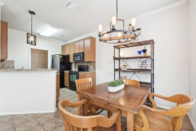2632 Century Park Blvd Unit 38, Austin, TX 78727 - dining space with a chandelier, crown molding, light tile patterned floors, and baseboards