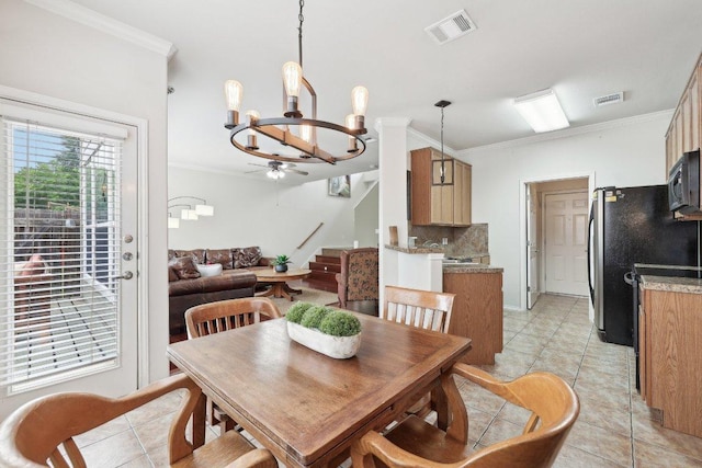 2632 Century Park Blvd Unit 38, Austin, TX 78727 - dining area with crown molding, a ceiling fan, stairway, light tile patterned floors, and a chandelier