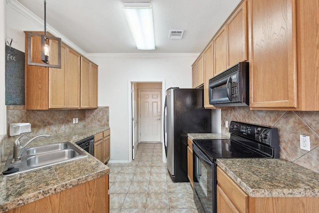 2632 Century Park Blvd Unit 38, Austin, TX 78727 - kitchen featuring black appliances, a sink, ornamental molding, tasteful backsplash, and baseboards