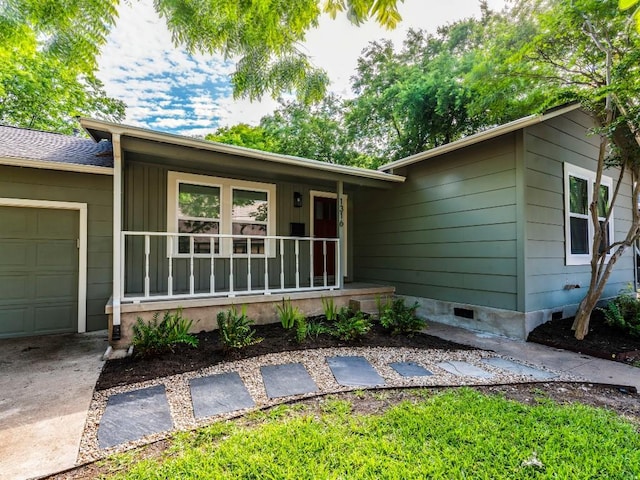 1316 Arcadia Ave, Austin, TX 78757 - ranch-style home with a porch, a garage, and crawl space