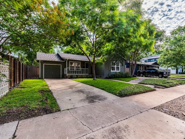 1316 Arcadia Ave, Austin, TX 78757 - view of front of home with concrete driveway and an attached garage