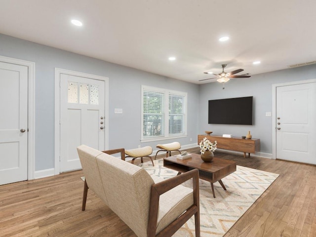 1316 Arcadia Ave, Austin, TX 78757 - living room featuring ceiling fan, recessed lighting, light wood-style floors, and baseboards