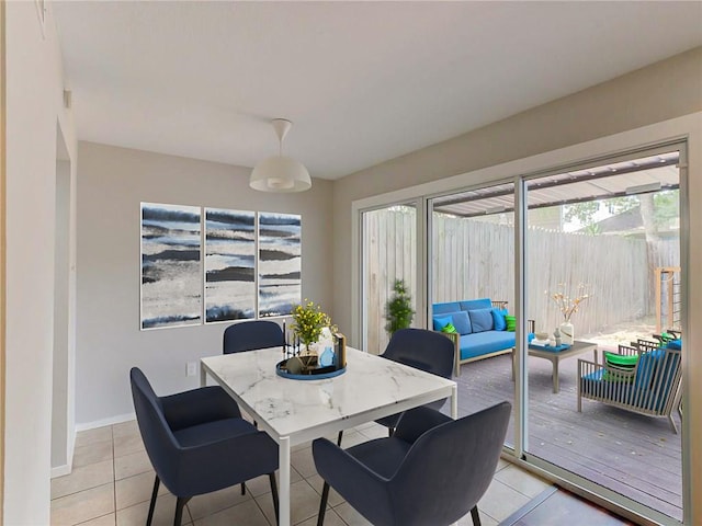 1710 Cinnamon Path, Austin, TX 78704 - dining area with light tile patterned flooring and baseboards