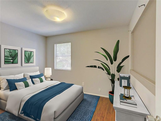 1710 Cinnamon Path, Austin, TX 78704 - bedroom with wood finished floors and baseboards