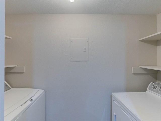 1710 Cinnamon Path, Austin, TX 78704 - laundry area featuring independent washer and dryer and electric panel