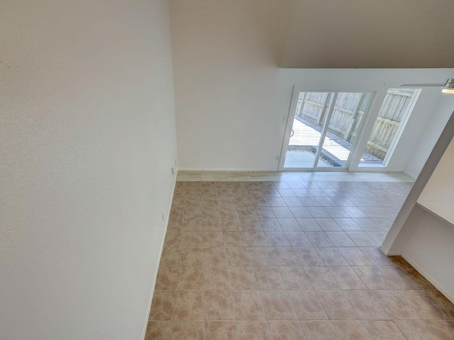 1710 Cinnamon Path, Austin, TX 78704 - spare room featuring baseboards and light tile patterned floors