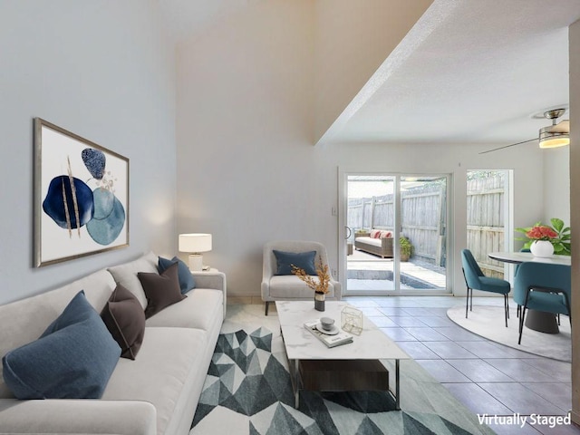 1710 Cinnamon Path, Austin, TX 78704 - living room with a towering ceiling, tile patterned floors, and ceiling fan