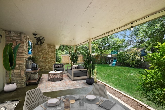 10300 Parkfield Dr, Austin, TX 78758 - fenced backyard featuring a playground, a patio, and an outdoor hangout area