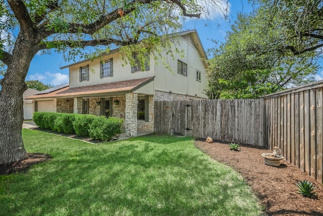 10300 Parkfield Dr, Austin, TX 78758 - view of front of property with stone siding and a garage