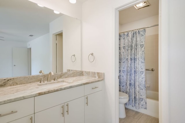 10300 Parkfield Dr, Austin, TX 78758 - full bathroom with vanity, shower / bath combo with shower curtain, and tile patterned floors