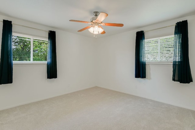 10300 Parkfield Dr, Austin, TX 78758 - empty room with carpet flooring and a ceiling fan