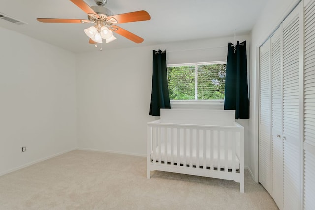 10300 Parkfield Dr, Austin, TX 78758 - unfurnished bedroom with a closet, carpet flooring, and a ceiling fan