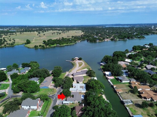 111 Dove Rd, Highland Haven, TX 78654 - aerial overview of property's location with a large body of water and nearby suburban area