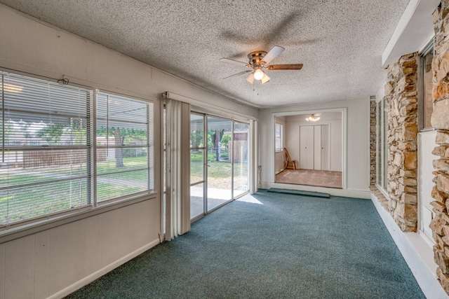 111 Dove Rd, Highland Haven, TX 78654 - unfurnished sunroom featuring a ceiling fan