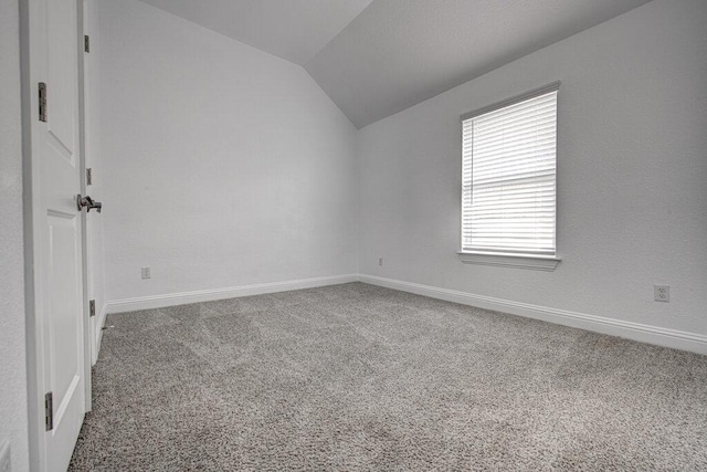 20908 Akbash Ln, Pflugerville, TX 78660 - empty room with vaulted ceiling and carpet