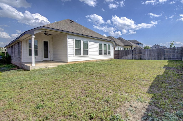 20908 Akbash Ln, Pflugerville, TX 78660 - back of property with ceiling fan and a patio area