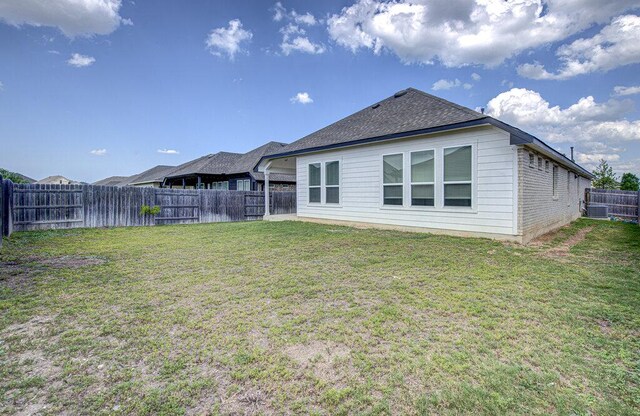 20908 Akbash Ln, Pflugerville, TX 78660 - back of property featuring a fenced backyard