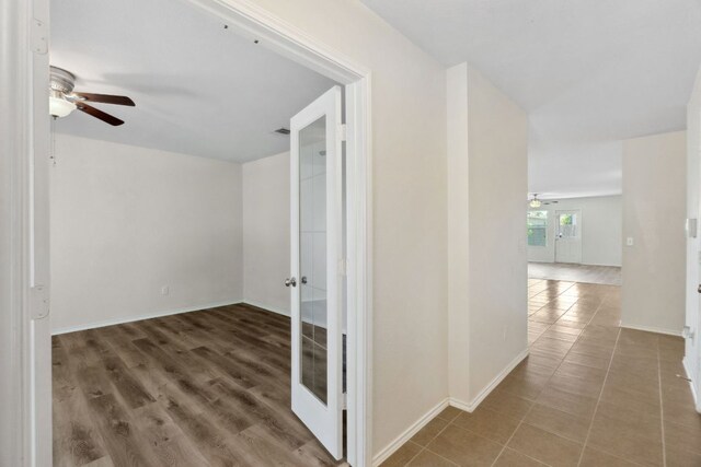 4608 Cleto St, Austin, TX 78725 - corridor featuring french doors and baseboards