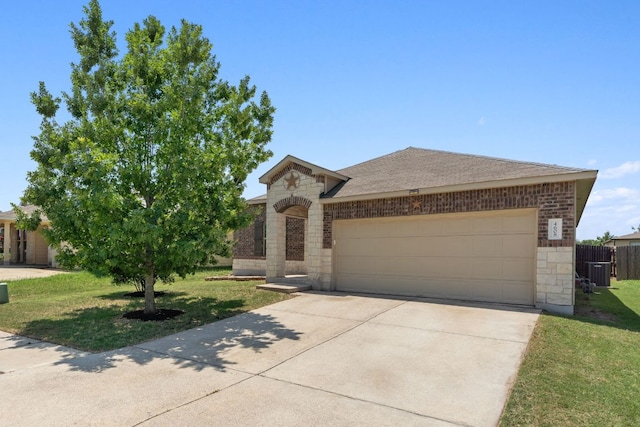4608 Cleto St, Austin, TX 78725 - view of front of property with stone siding, a garage, concrete driveway, and central AC unit