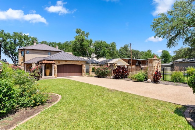 507 Sandy Mountain Dr, Sunrise Beach, TX 78643 - view of front of house featuring an attached garage, driveway, a chimney, a standing seam roof, and stone siding