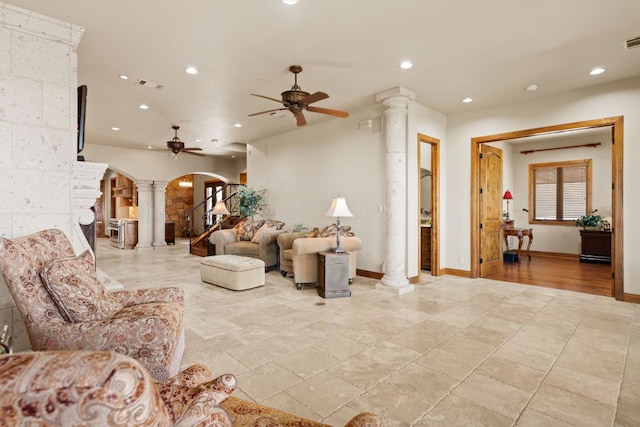 507 Sandy Mountain Dr, Sunrise Beach, TX 78643 - living area with decorative columns, arched walkways, ceiling fan, recessed lighting, and baseboards