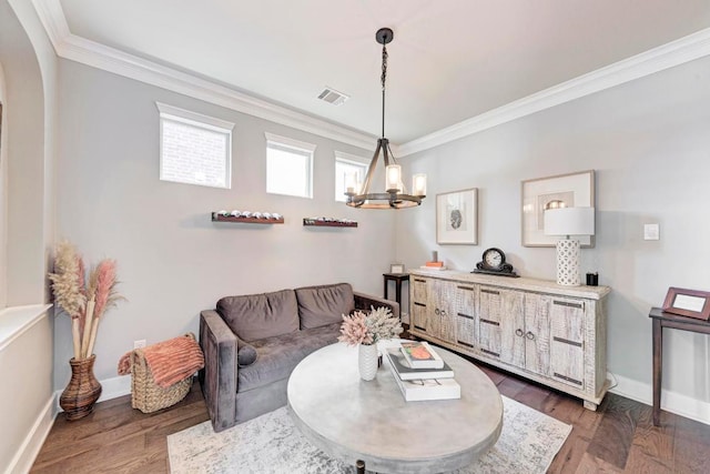 2407 Powderham Ln S, Cedar Park, TX 78613 - living area featuring crown molding, dark wood-style flooring, a chandelier, baseboards, and arched walkways
