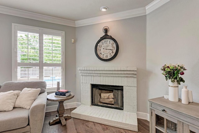 2407 Powderham Ln S, Cedar Park, TX 78613 - living area featuring crown molding, wood finished floors, plenty of natural light, a fireplace, and baseboards
